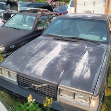 1989 Volvo 740 Turbo motorista esquerdo farol duplo moldura e conjunto de luz fabricante de equipamento original, usado comprar usado  Enviando para Brazil