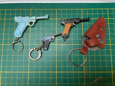 Porte clefs pistolet d'occasion  Montfort-l'Amaury