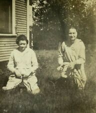 Two women sitting for sale Two women sitting for sale  Foley