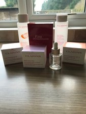 Selection clarins containers for sale  SPALDING
