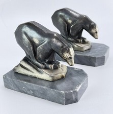 2 suportes de livro art déco originais com ursos polares na base de mármore aprox. Década de 1930 comprar usado 2 suportes de livro art déco originais com ursos polares na base de mármore aprox. Década de 1930 comprar usado  Enviando para Brazil