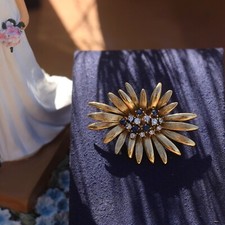 Broche doré art d'occasion  Paris VI