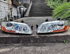 Mitsubishi headlight lancer d'occasion  Expédié en Belgium