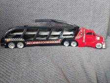 Mattel 2000 Hot Wheels Cargo Carrier Semi Truck 19" Vermelho/preto com 8 carros Suprise comprar usado Mattel 2000 Hot Wheels Cargo Carrier Semi Truck 19" Vermelho/preto com 8 carros Suprise comprar usado  Enviando para Brazil