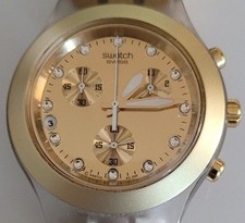 Relógio multifuncional Swatch Swiss Irony diaphane tom dourado quartzo comprar usado  Enviando para Brazil