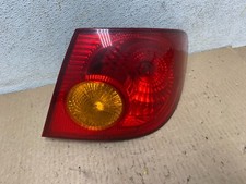 Lanterna traseira lateral direita passageiro Toyota Corolla 2003 a 2005 fabricante de equipamento original D1676 DG1, usado comprar usado  Enviando para Brazil