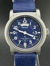 Seiko SUS relógio de quartzo masculino mostrador azul estilo militar data do dia 32mm 7N33-6050 comprar usado  Enviando para Brazil