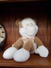 Peluche singe assis d'occasion  Mirambeau