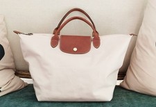 Véritable sac longchamp d'occasion  Notre-Dame-d'Oé