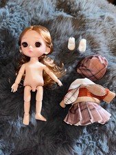 Jolie petite poupée d'occasion  Aups
