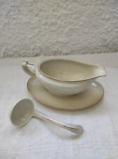 Salsiera con mestolino usato Salsiera con mestolino usato  Manziana