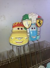 Disney Pixar Cars 2 moedas cofrinho Luigi & Guido Fiat & Ferrari loja exclusiva comprar usado  Enviando para Brazil