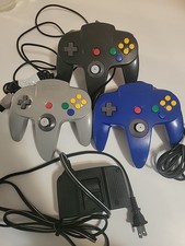 LOTE N64! 3 controladores OEM e adaptador CA. Tudo TESTADO e funcionando leitura comprar usado  Enviando para Brazil