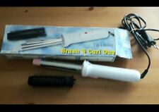 Brosse chauffante ondulante d'occasion  Sète