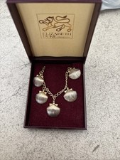 Golden toned shell for sale  GRANTHAM