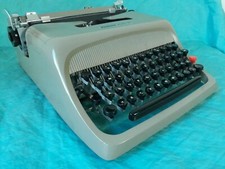 1954 Olivetti Studio 44 máquina de escrever manual portátil - funciona muito bem comprar usado  Enviando para Brazil