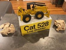 N.Z.G. Models CAT 528 Log Skidder Art. Nr. 220 Fabricado na Alemanha Ocidental N.I.B. 👍👌 comprar usado  Enviando para Brazil