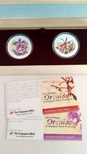 Singapur 2 x 5 dólares 2010 Orquídeas Flor Plata 2 x 20 gr Caja/COA (¿oz?) segunda mano  Embacar hacia Mexico