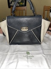 Bolsa de couro Kate Spade preta e marfim com alça superior e alça transversal e bolsa de pó comprar usado Bolsa de couro Kate Spade preta e marfim com alça superior e alça transversal e bolsa de pó comprar usado  Enviando para Brazil