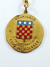 Porte cles champagne d'occasion  L'Absie