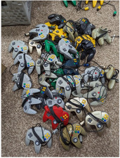 Lote de 25 controles Nintendo 64 N64 autênticos *vendidos como estão* comprar usado  Enviando para Brazil