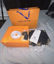 Louis vuitton petite d'occasion  Expédié en Belgium