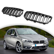 Grille noire brillante d'occasion  Expédié en France
