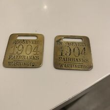 Two brass tags for sale  BROUGH