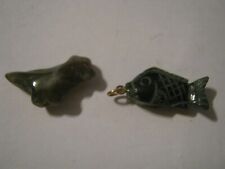 Two green charms for sale  Miami