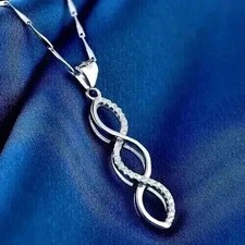 Pendentif femme torsadé d'occasion  Expédié en France