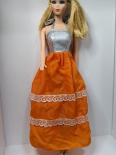 Robe matière argentée d'occasion  Paris XX