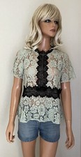 Top blouse verte d'occasion  Castelnau-de-Médoc