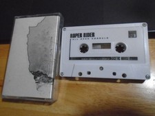RARE OOP Roper Rider CASSETTE TAPE All Open Corrals 2016 tribal electronic 11trx comprar usado RARE OOP Roper Rider CASSETTE TAPE All Open Corrals 2016 tribal electronic 11trx comprar usado  Enviando para Brazil