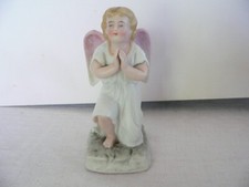 Ancien ange genoux d'occasion Ancien ange genoux d'occasion  Ussac