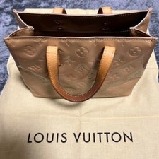 Vuitton hand held d'occasion  Expédié en Belgium