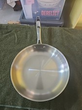 Frigideira Tramontina 10" diâmetro tripla folheada aço inoxidável forno de indução seguro.  comprar usado  Enviando para Brazil