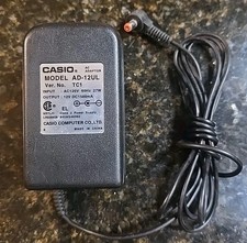 Adaptador de Alimentação Casio AD-12UL TC1 12v 1500mA Ponta Vermelha Classe 2 OEM Original Genuíno comprar usado Adaptador de Alimentação Casio AD-12UL TC1 12v 1500mA Ponta Vermelha Classe 2 OEM Original Genuíno comprar usado  Enviando para Brazil