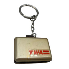 Mala de plástico vintage TWA novidade chaveiro bola de chiclete máquina prêmio década de 1980 comprar usado  Enviando para Brazil