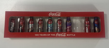 Conjunto de 9 mini garrafas de alumínio colecionáveis 100 anos de Coca-Cola 2014 comprar usado  Enviando para Brazil
