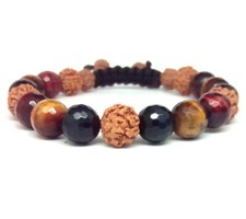 Bracelet oeil tigre d'occasion  Cannes-La-Bocca