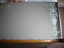 Miroir mural argenté d'occasion  Andrésy