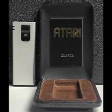 ULTRA SLIM Vintage Retro ATARI Isqueiro de Quartzo com Estojo. Chama Ajustável. Funciona. comprar usado  Enviando para Brazil