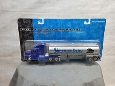 Semi caminhão brinquedo Freightliner 1/64 Ertl com tanque de leite Simonson Dairy novo na caixa! comprar usado  Enviando para Brazil