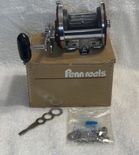 Carretel, caixa, braçadeira e chave de água salgada Penn 500L Jigmaster - quase em perfeito estado comprar usado  Enviando para Brazil