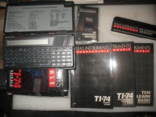 Calculadora programável Texas Instruments TI-74 com 3 manuais, caixa, 2 cartuchos comprar usado  Enviando para Brazil