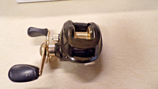 MOLINETE DE PESCA BASS PRO SHOPS - ESCURECIMENTO - 6:3:1 G.R. - 5 ROLAMENTOS DE ESFERAS - MUITO LIMPO comprar usado  Enviando para Brazil