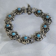 Bracelet fleurs coeurs d'occasion  Le Luc