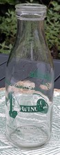 Ancienne bouteille publicitair d'occasion  Bully-les-Mines