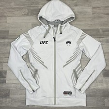 Moletom com capuz BRANDON MORENO UFC OFFICIAL VENUM WALK OUT TAMANHO GRANDE L FEMININO comprar usado Moletom com capuz BRANDON MORENO UFC OFFICIAL VENUM WALK OUT TAMANHO GRANDE L FEMININO comprar usado  Enviando para Brazil