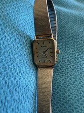 Mały damski prostokątny zegarek na rękę vintage RADO złoty - nie działa, sprzedawany na części na sprzedaż  Wysyłka do Poland